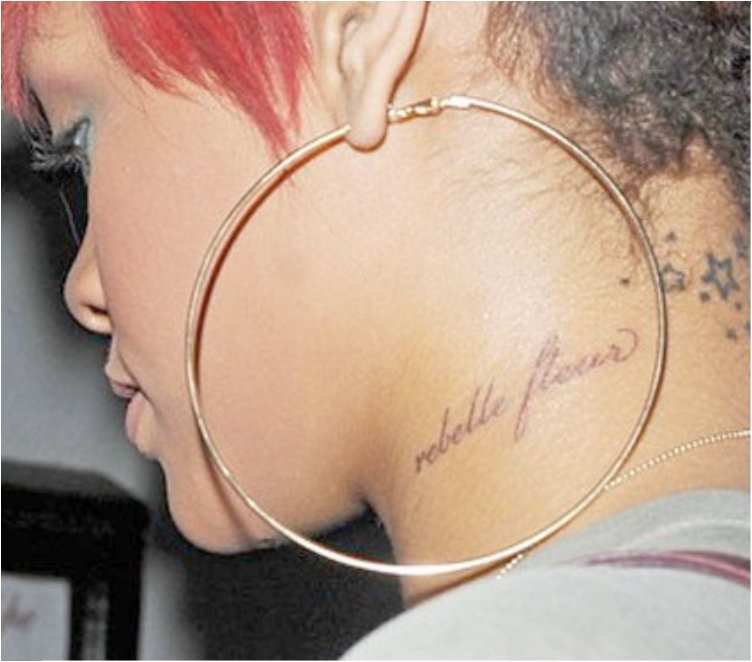 Discover The Secrets Behind 18 Of Rihanna's Tattoos