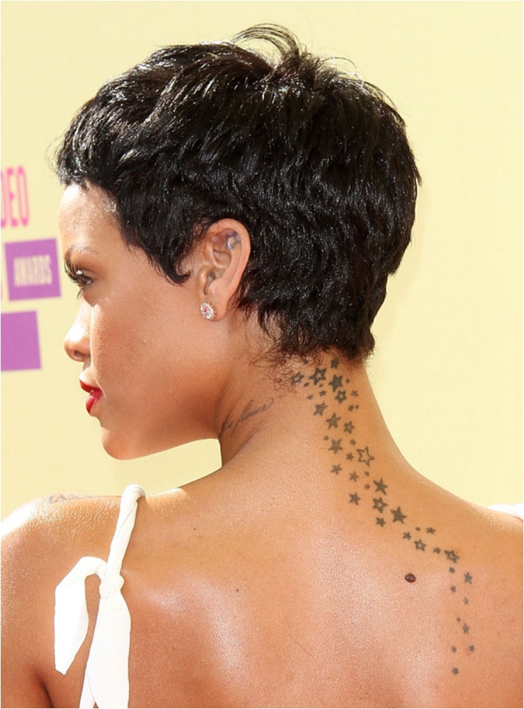 Discover The Secrets Behind 18 Of Rihanna's Tattoos