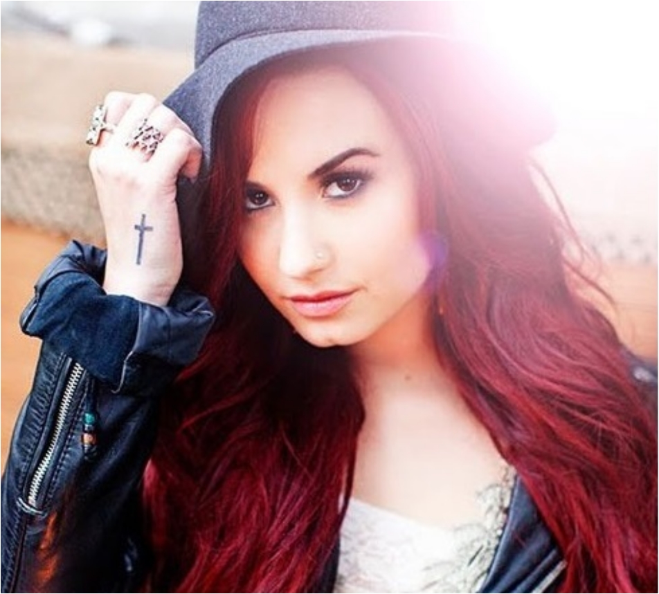 Demi Lovato's 15 Tattoos And Their Meaning