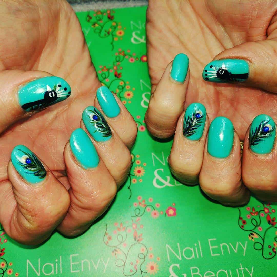 25 Beautiful Feather Nail Designs To Blow You Away