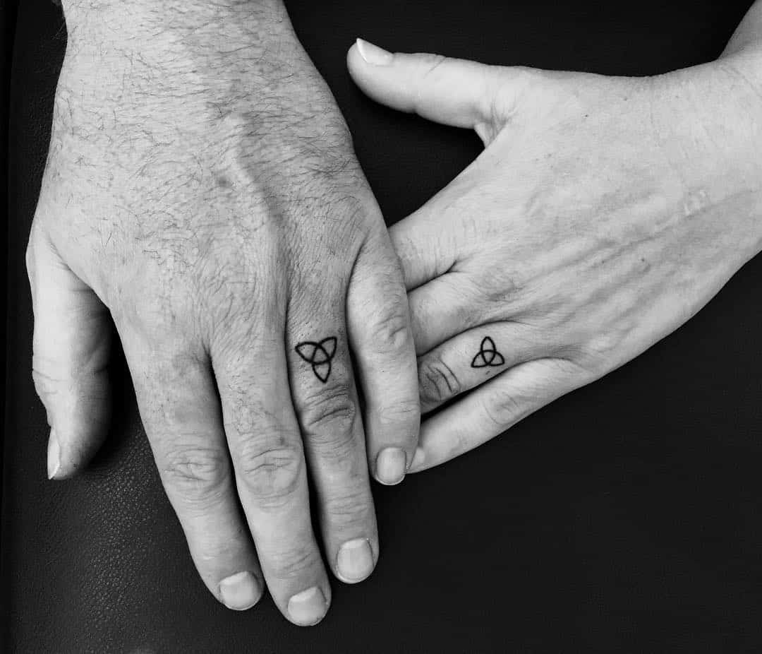 30 Touching And Sweet Wedding Ring Tattoos