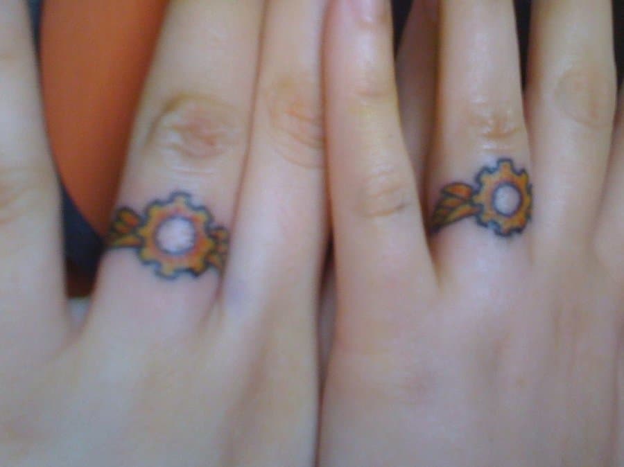 30 Touching And Sweet Wedding Ring Tattoos